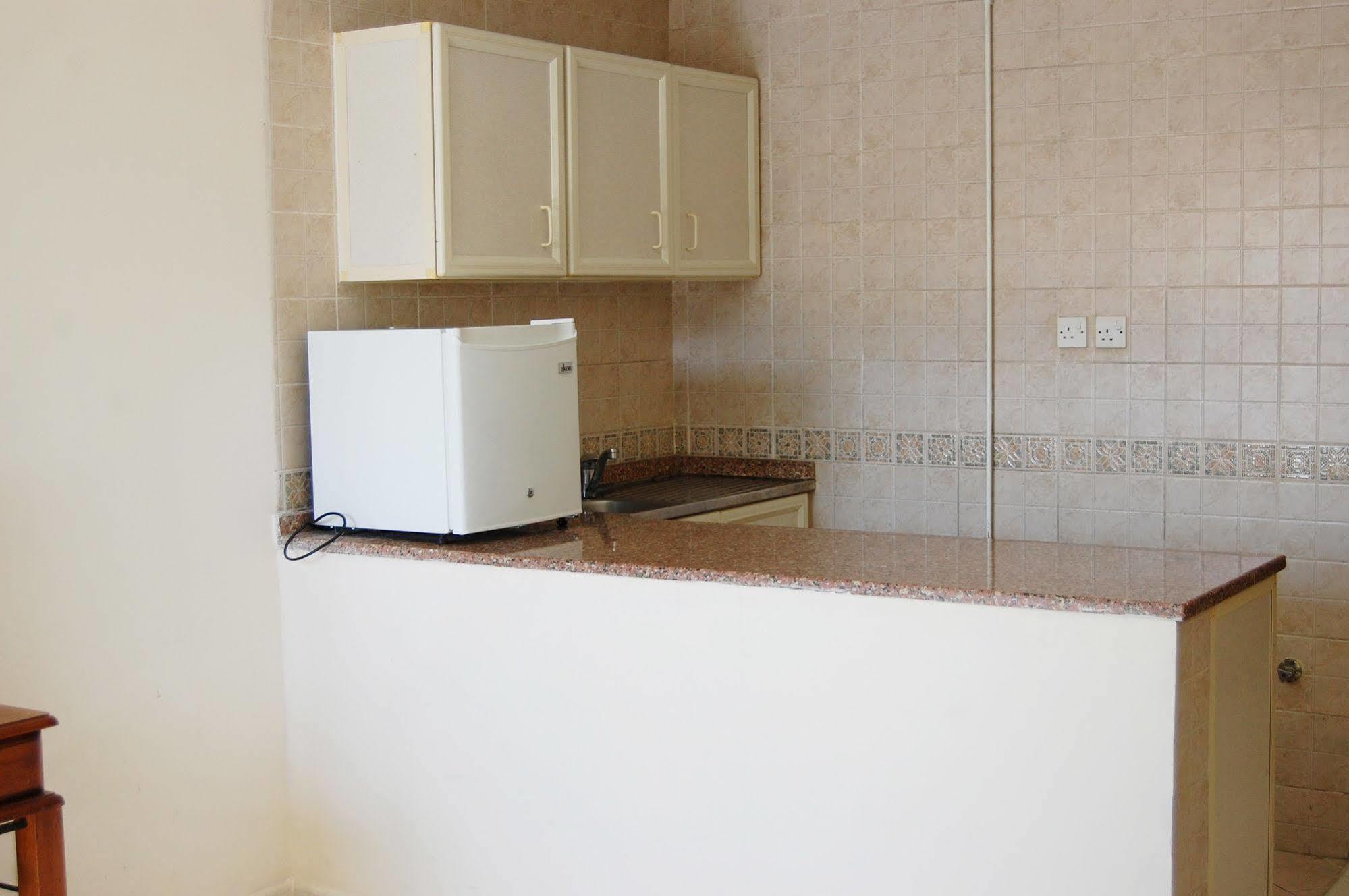 Al Ferdous Hotel Apartment Sharjah Exterior photo
